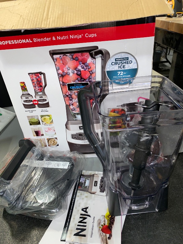 Photo 1 of Ninja BL660 Professional Compact Smoothie & Food Processing Blender, 1100-Watts, 3 Functions -for Frozen Drinks, Smoothies, Sauces, & More, 72-oz.* Pitcher, (2) 16-oz. To-Go Cups & Spout Lids, Gray
