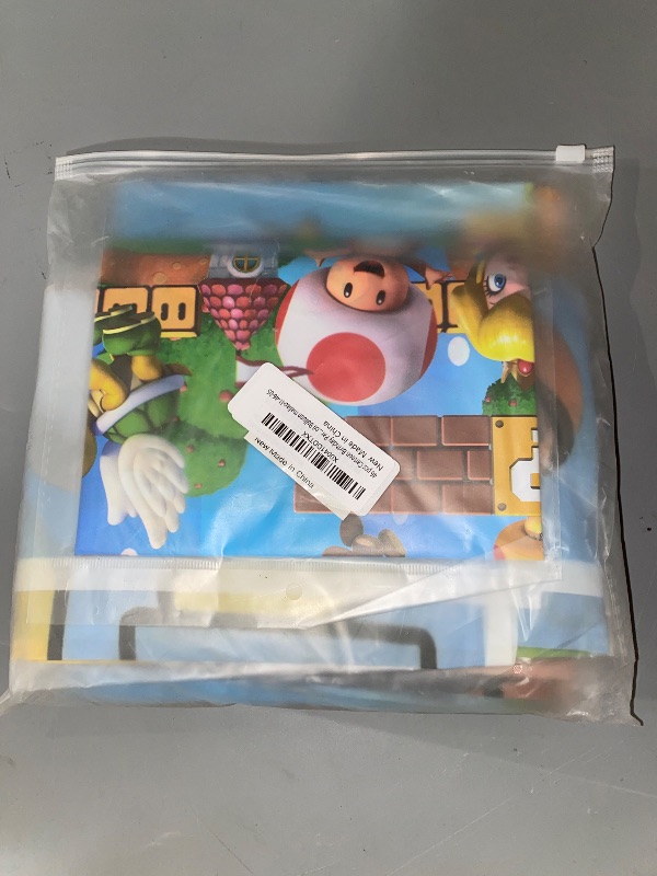 Photo 1 of Mario Birthday Party Supplies, Party Decorations Set Include Banner, Backdrop, Balloons, Hanging Swirls, Cake Cupcake Toppers, Tablecloth for Boys Girls Mario Theme Party

