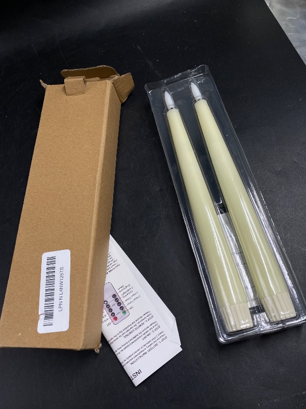 Photo 1 of Homemory 2 Pcs Waxy Flameless Taper Candles with Remote, Flickering Battery Operated Taper Candles, Led Flameless Candlesticks Classic Tall Candles for Home, Wedding, Party, Ivory, 9.6 inches