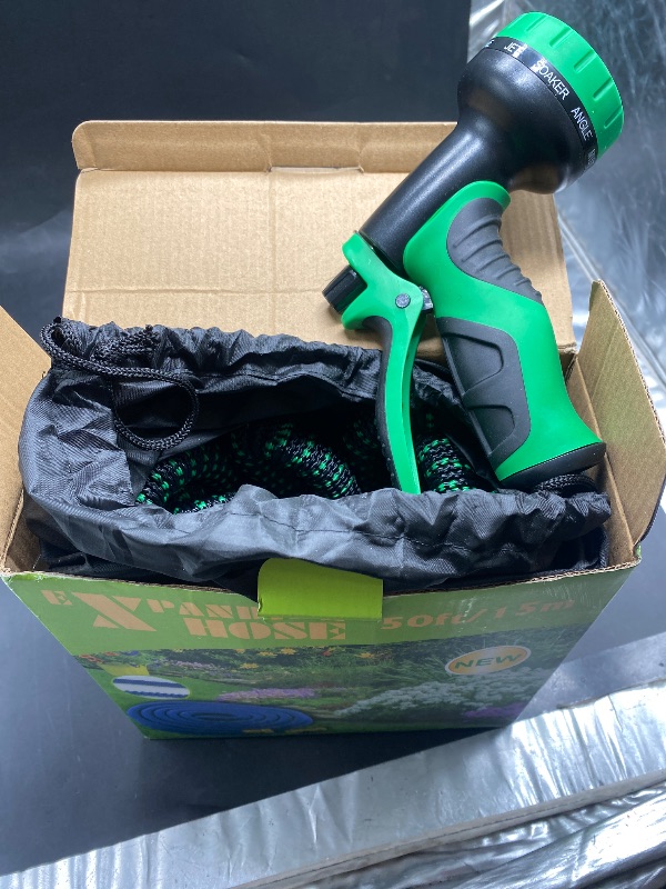 Photo 1 of Expandable Garden Hose 150 ft Water Hose with 10 Function Spray Nozzle, Lightweight Flexible Hose with 3/4 Inch Solid Fittings and 4-Layer Latex Core, 150ft Retractable Stretch Hose, Black & Green
