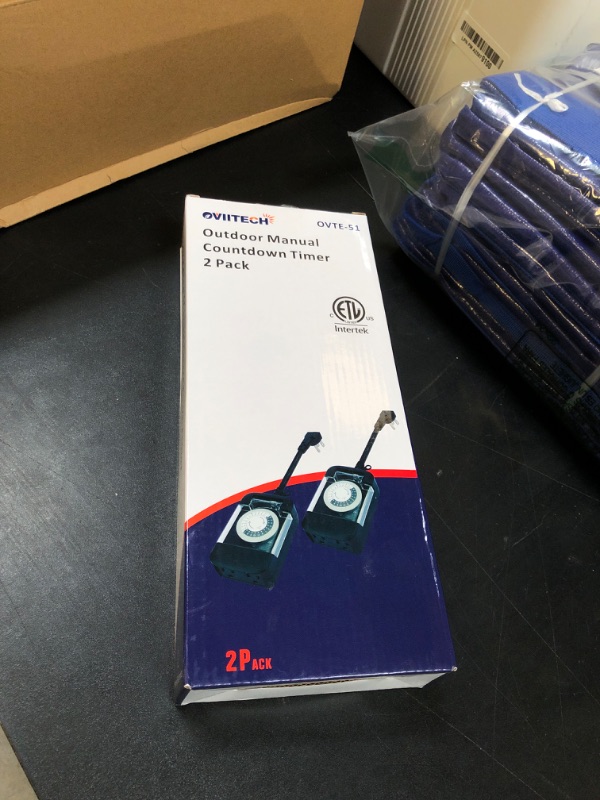 Photo 1 of 24 Hour Outdoor Mechanical Timer Switch with Two Ground outlets, Variable on/Off Setting Every 30 Minutes, 48 pin Setting dial, up to 24 Events per Day,ETL Listed,Black