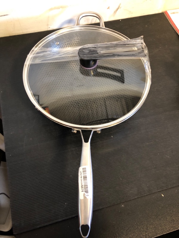 Photo 1 of Vegoran 13 inch Wok Pan,Stainless Steel Stir-fry Wok, Non Stick Honeycomb Skillet with Stay Cool Handle- Suitable for Induction, Ceramic, Electric, and Gas Cooktops (13" Honeycomb Wok Pan with Lid)