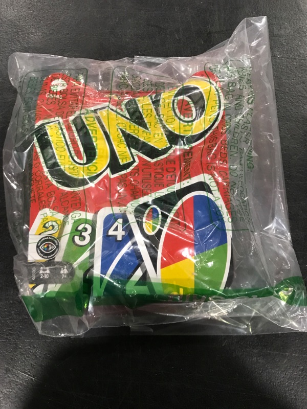 Photo 1 of Mattel Games UNO Card Game for Family Night, Travel Game & Gift for Kids in a Collectible Storage Tin for 2-10 Players (Amazon Exclusive)