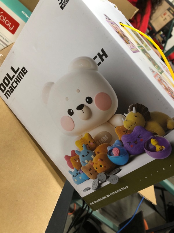 Photo 1 of Jovow Rabbit Claw Machine for Kids, Mini Vending Machine with Game Coins & Music, Prize Dispenser Toys for Girls and Boys, Electronic Claw Game Machine for Party Birthdays, Includes 30 Mini Toys