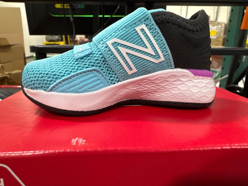 Photo 2 of New Balance Baby Fresh Foam Roav V1 Bungee Running Shoe, Summer Aqua/Cosmic Rose/Black, 4 Wide US Unisex Infant