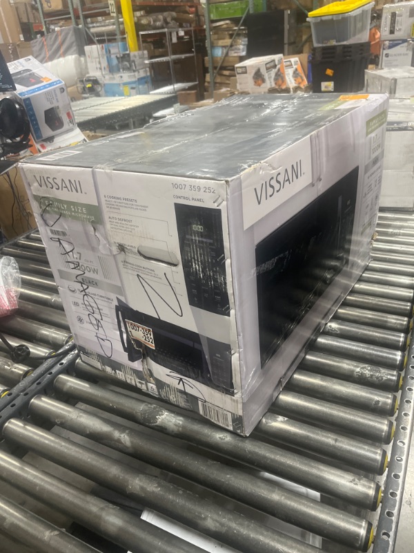 Photo 1 of 1.7 cu. ft. 1000-Watt Over the Range Microwave in Black