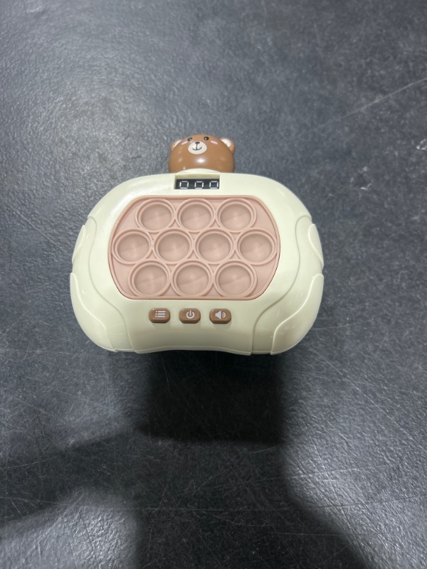 Photo 1 of QUICK PUSH FIDGET TOY 