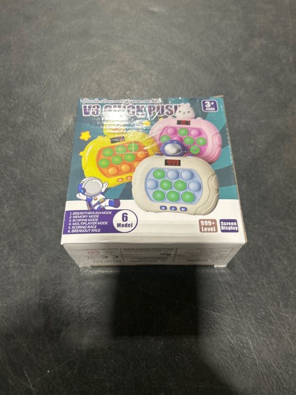 Photo 2 of QUICK PUSH FIDGET TOY 