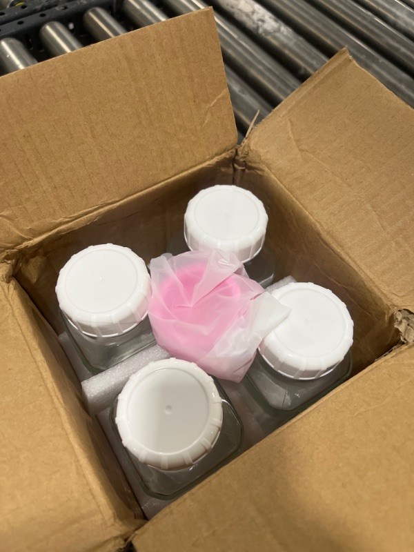 Photo 1 of 4 Pack 16 Oz Square Glass Milk Bottle With A Silicone Dispenser Cap, Glass Juice Bottles with Airtight Screw Lid, Drinking Bottles With Capacity Marks