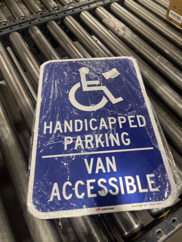 Photo 2 of SmartSign 18 x 12 inch “Handicapped Parking - Van Accessible” Sign, 63 mil Aluminum, 3M Laminated Engineer Grade Reflective Material, Blue and White