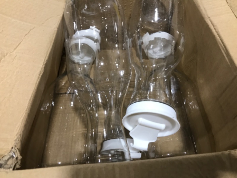 Photo 2 of Clear Plastic Water Pitchers Carafes with Flip top White Lids 50 OZ Heavy Duty Beverage Pitcher Jug for Juice or iced Coffee Great for Mimosa bar Restuarants ot Schools Pack of 6