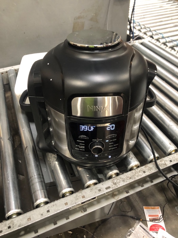 Photo 1 of Ninja FD401 Foodi 12-in-1 Deluxe XL 8 qt. Pressure Cooker & Air Fryer that Steams, Slow Cooks, Sears, Sautes, Dehydrates & More, with 5 qt. Crisper Basket, Deluxe Reversible Rack & Recipe Book, Silver