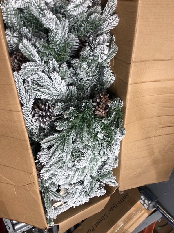 Photo 2 of 6.5 Ft Pre- Snow Flocked Slim Fir Christmas Tree with 1085 PE & PVC Mixed Branch Tips,Artificial Skinny Pencil Xmas Tree with 700 Warm-White Lights & 37 Pine Cones,Hinged Pine Tree with Metal Stand