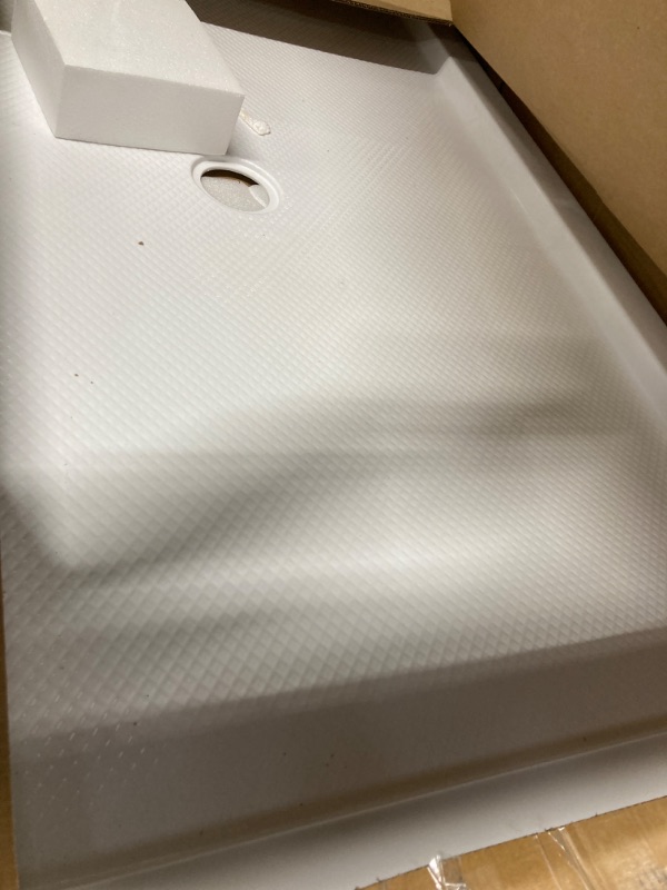 Photo 1 of DreamLine SlimLine 36 in. D x 60 in. W x 2 3/4 in. H Center Drain Single Threshold Shower Base in White