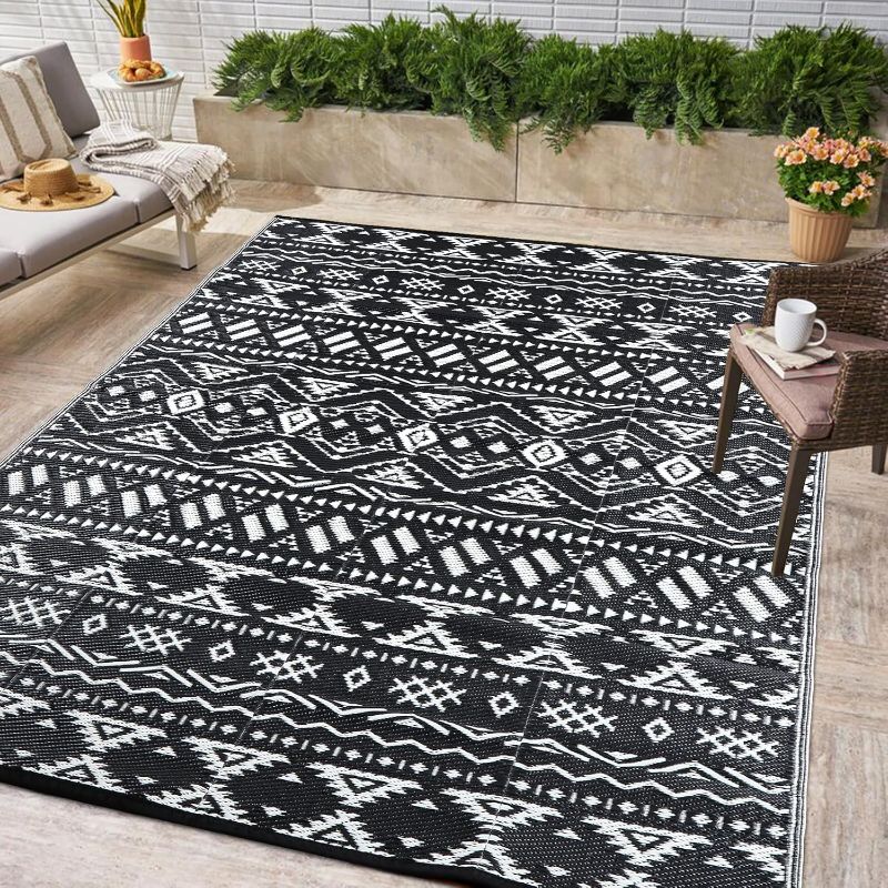 Photo 1 of 
Pendolr 5’x8’ Outdoor Rug Waterproof Carpet Patio Rug Outdoor Plastic Straw Rug Camping Rug Reversible Outside Outdoor Area Rug for Balcony Deck Backyard RV Picnic Beach Black&White 02#
