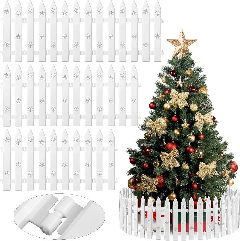 Photo 1 of Aodaer 36 Pieces Christmas Tree Fences Plastic Picket Fence 12 Inch Christmas Fence Border Tree Barrier for Christmas Party Wedding Garden Home Fence Decoration, White