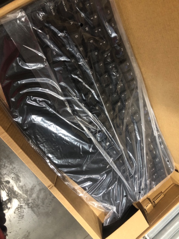 Photo 1 of Amazon Basics Ergonomic Wireless Combo Full-Sized Keyboard with Palm Rest and Comfortable Right-Handed Mouse, 2.4 GHz Wireless USB Receiver, Compatible with PC, Laptop, Black