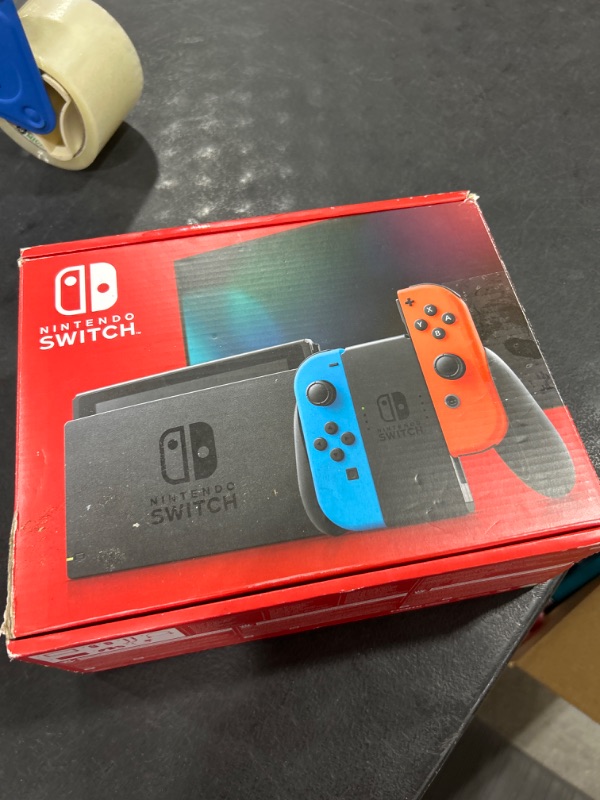 Photo 5 of Nintendo Switch™ with Neon Blue and Neon Red Joy?Con™ (Renewed)