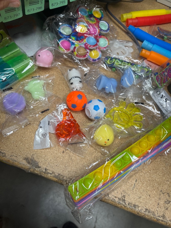 Photo 1 of  Fidget Toys Pack, Party Favors Stress Relief & Anxiety Relief Sensory Toy, Classroom