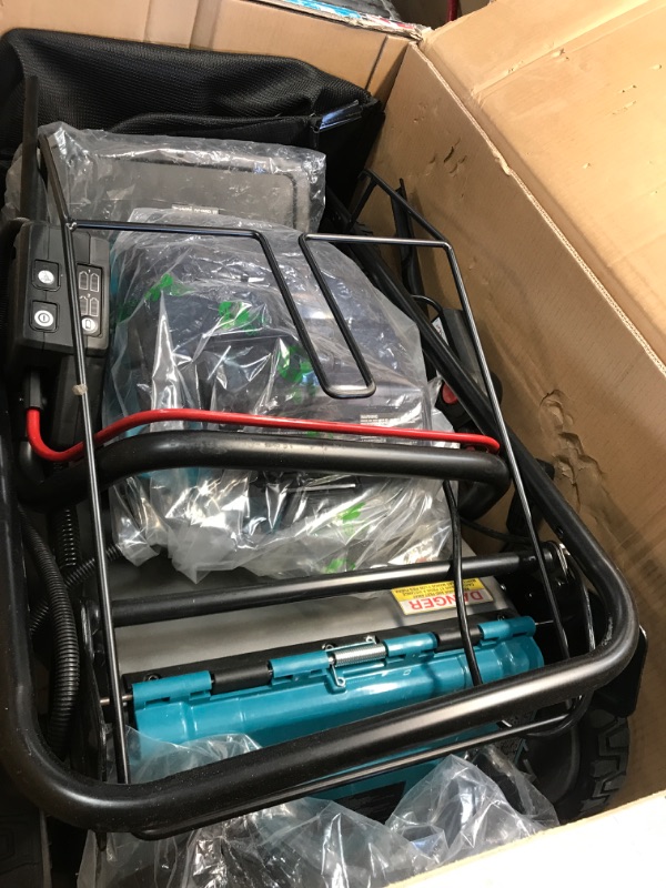 Photo 2 of ***MISSING THE KEY, BATTERIES, AND CHARGER*************Makita XML07PT1 36V (18V X2) LXT® Brushless 21" Commercial Lawn Mower Kit with 4 Batteries (5.0Ah), Teal