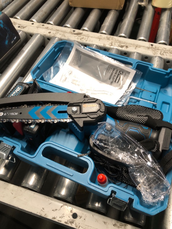 Photo 1 of Saker Mini Chainsaw,6 Inch Portable Electric Chainsaw Cordless, Small Handheld Chain saw for Tree Branches,Courtyard, Household and Garden,By 2PCS 20V 1500mAh Batteries,Extra 3 PCS Chain