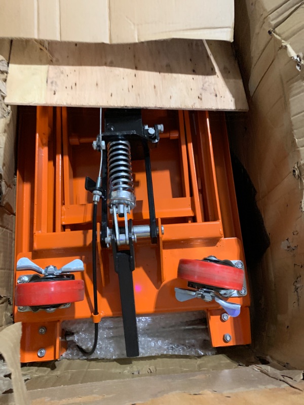 Photo 1 of VEVOR Hydraulic Lift Table Cart, 330lbs Capacity 28.5" Lifting Height, Manual Single Scissor Lift Table with 4 Wheels and Non-Slip Pad, Hydraulic Scissor Cart for Material Handling and Transportation