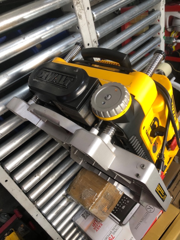 Photo 9 of ***HEAVILY USED - LIKELY MISSING PARTS - UNABLE TO TEST - SEE PICTURES***
DEWALT Planer, Thickness Planer, 13-Inch, 3 Knife for Larger Cuts, Two Speed 20,000 RPM Motor, Corded (DW735)