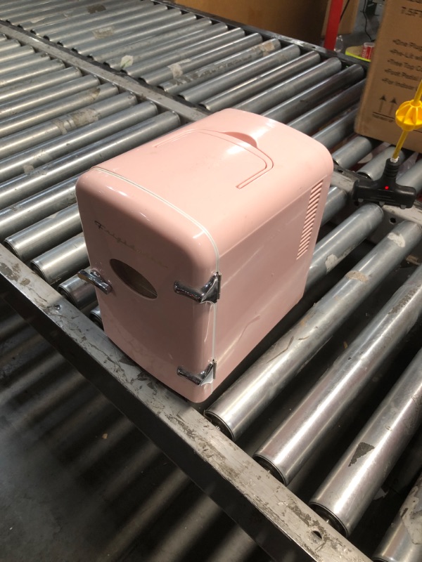 Photo 2 of ***USED - NO PACKAGING - POWERS ON, UNABLE TO TEST FURTHER***
Frigidaire EFMIS175-PINK Portable Mini Fridge-Retro Extra Large 9-Can Travel Compact Refrigerator