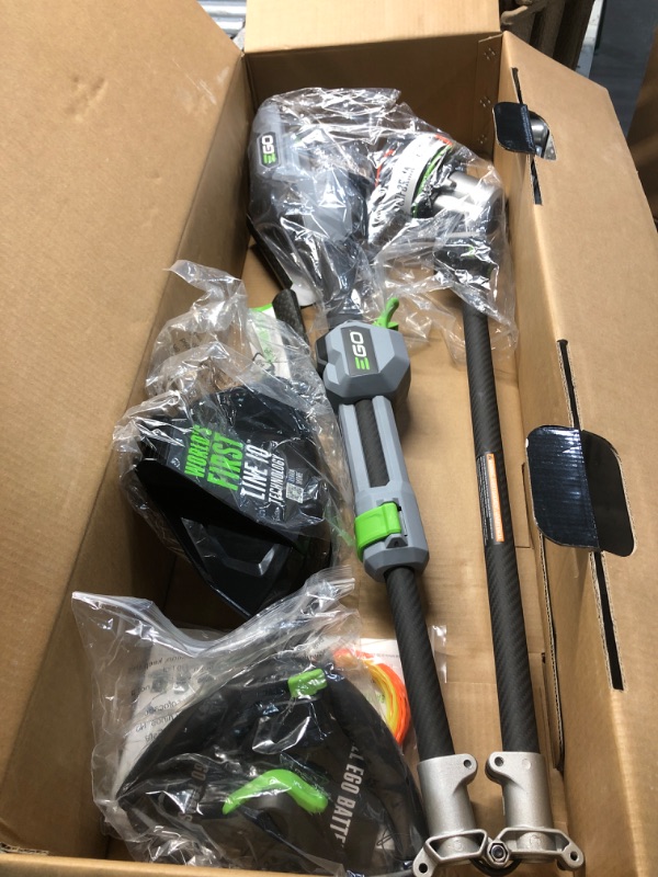 Photo 1 of ***MISSING BATTERY UNABLE TO TEST ITEM*** EGO POWER + POWERLOAD with LINE IQ 56-volt 16-in Telescopic Shaft Battery String Trimmer 4 Ah (Battery and Charger Included)