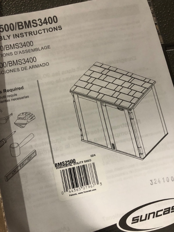 Photo 1 of Suncast 34 Cu Ft Capacity Horizontal Outdoor Storage Shed for Garbage Cans, Garden Accessories, Backyard, and Patio Use, Vanilla