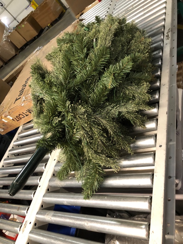 Photo 5 of ***DAMAGED - CORD CUT - SEE PICTURES***
7-1/2 Ft. Carolina Pine Hinged Artificial Christmas Tree with 86 Flocked Cones and 750 Clear Lights