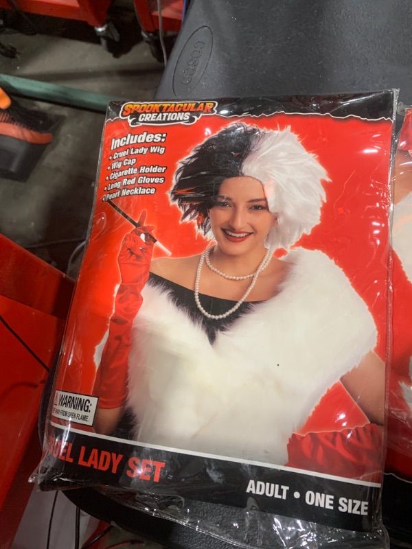 Photo 1 of Spooktacular Creations Women Cruel Lady Costume Wig Set, Halloween Costume Accessories, Black and White Wig, Cosplay Party Accessories with Gloves, Holder, Necklace and Short Bob Wavy Wig