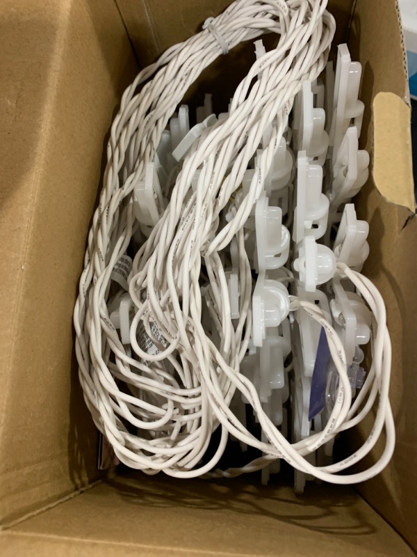 Photo 1 of Snowflake Christmas String Lights with 9 Drops - 13ft 150 Mini Bulb Icicle Lights with Clips, Plug-in Connectable Hanging Lights for Front Porch House Tree Pation Decor Holiday Décor