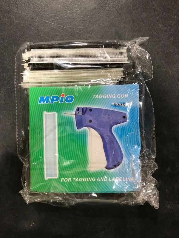 Photo 1 of Quick Clothing Fixer,Quilt Tacking Gun, Mini Stitchy Gun,Mini Stitch Hemming Gun for Clothes,Instant Button Garment Connector?Purple?