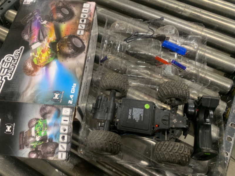 Photo 2 of AONEPTR Remote Control Car, All Terrain Remote Control Truck for Boy, 2.4GHz Rc Car with Bodylight and Two Rechargeable Batteries, 20KM/H Monster Truck Toys for Ages 4-7, 8-12