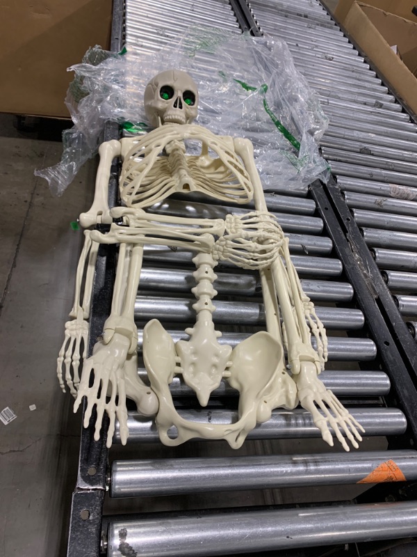 Photo 2 of 5.4FT Full Size Halloween Skeleton, Life Size Posable Skeleton with Glowing Eyes Scary Sound, Plastic Skeleton with Movable Joints for Halloween Decoration
