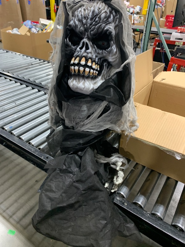 Photo 2 of Haunted Hill Farm 27 in. Animatronic Reaper, Halloween Decorations for Indoor or Covered Outdoor Display, Talking Halloween Prop with Spooky Light-up Red Eyes, Battery-Operated