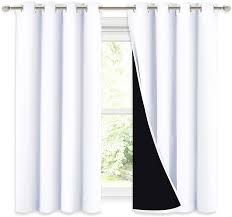 Photo 1 of NICETOWN 100% Blackout Curtains 54 inches Long, Double-Deck Completely Blackout Window Treatment Thermal Insulated Lined Drapes for Small Window (WHITE, 1 Pair, 52 inches Width Each Panel)