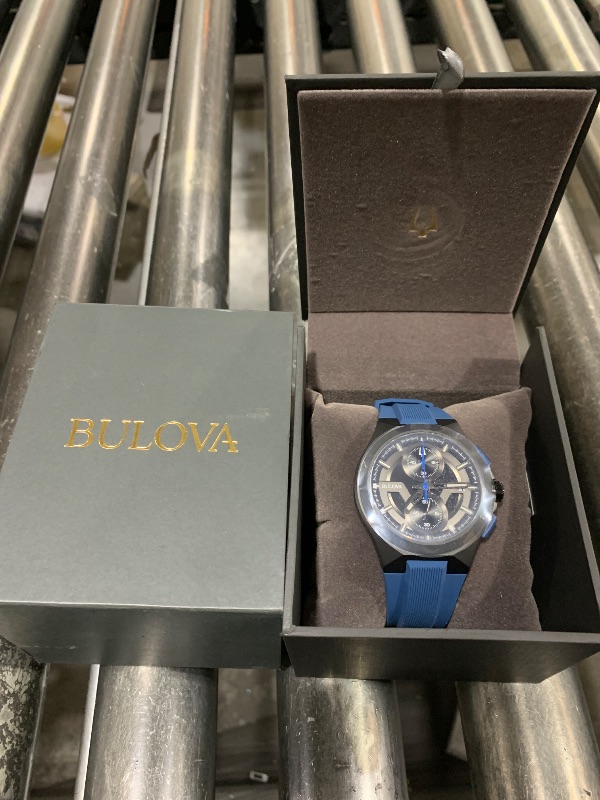 Photo 2 of Bulova Men's Maquina Sport Black Ion-Plated Stainless Steel Case, 6-Hand Chronograph Quartz Watch with Matte Black Silicone Strap, Sapphire Crystal, Blue Strap/Blue Accents