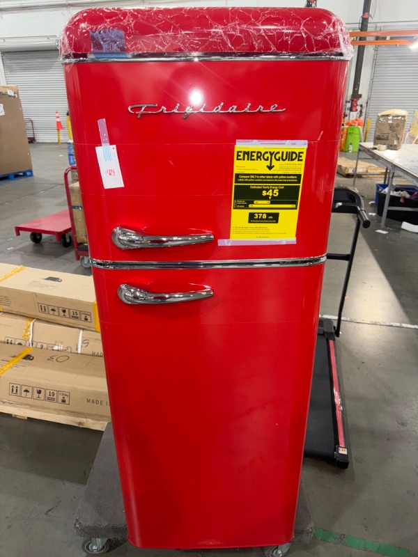 Photo 2 of *POWERS ON**FRIGIDAIRE EFR756-RED EFR756, 2 Door Apartment Size Retro Refrigerator with Top Freezer, Chrome Handles, 7.5 cu ft, red