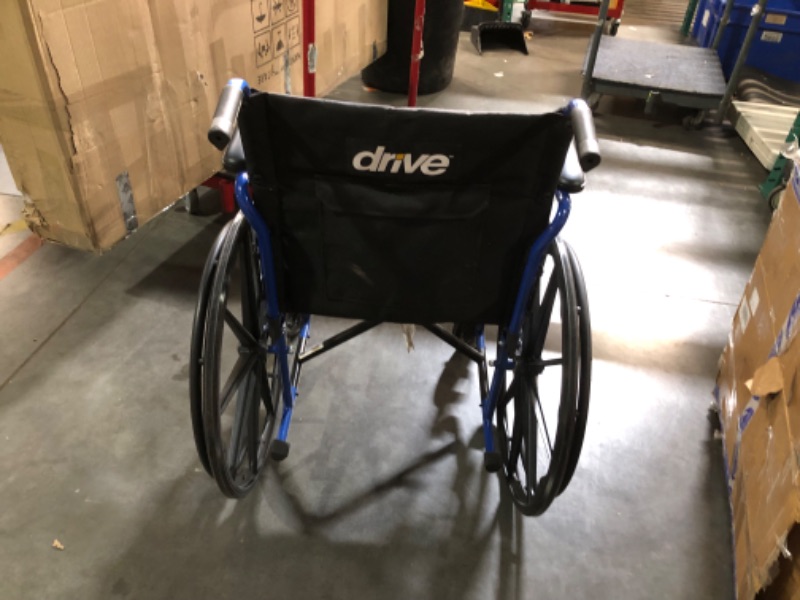 Photo 3 of ***USED - NO PACKAGING - MISSING LEG RESTS - SEE PICTURES***
Blue Streak Wheelchair with Flip Back Desk Arms, Elevating Leg Rests 20" Seat