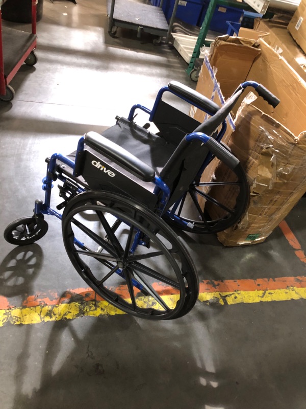 Photo 4 of ***USED - NO PACKAGING - MISSING LEG RESTS - SEE PICTURES***
Blue Streak Wheelchair with Flip Back Desk Arms, Elevating Leg Rests 20" Seat