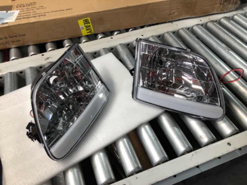 Photo 2 of ***USED - INCOMPLETE - NO BULBS - SEE PICTURES - MISSING HALF OF HEADLIGHT***
PIT66 Clear Lens Chrome Housing Amber Reflector Factory Style LED DRL strip Headlights & Corner Parking Lights Kit Pair Compatible with 1997-2002 Ford Expedition/2004 F150 Herit