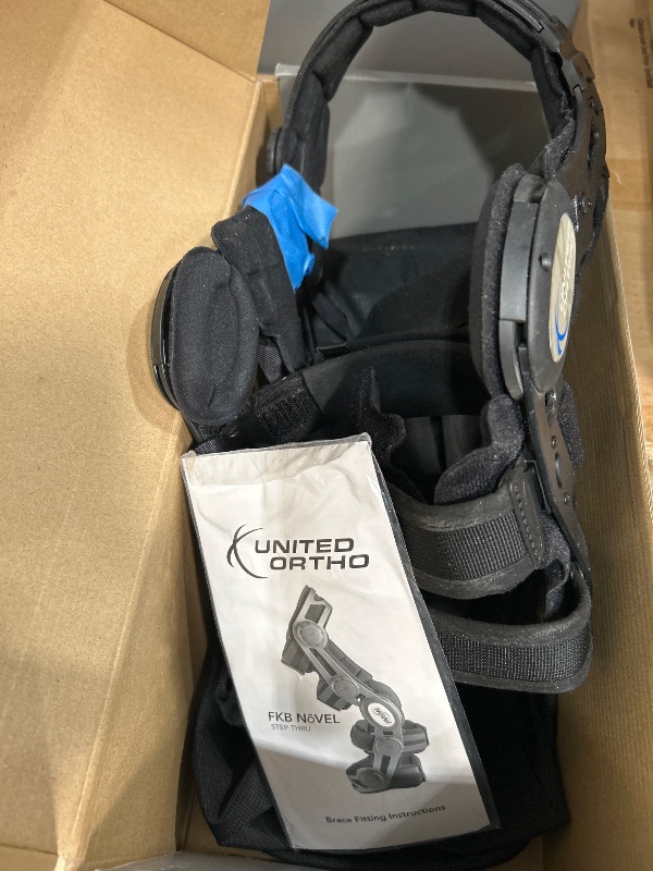 Photo 2 of (READ FULL POST) United Ortho 300851-07 Step-Thru Novel Functional Knee Brace, Right Leg, Large