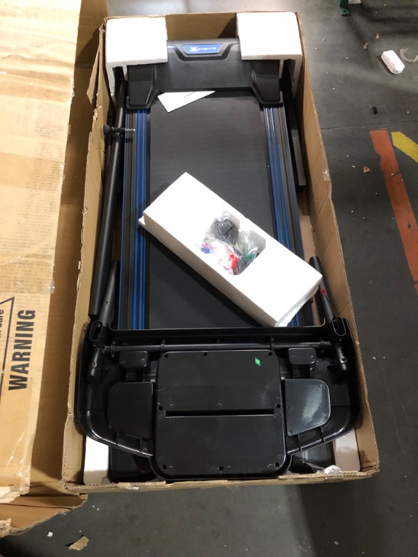 Photo 8 of ***USED - LIKELY MISSING PARTS - UNABLE TO VERIFY FUNCTIONALITY - SEE PICTURES***
XTERRA Fitness Premium Folding Smart Treadmill, Compact Design, 250+ LB Weight Capacity, Powerful Motor, XTERRA+ Fitness App Included with Purchase