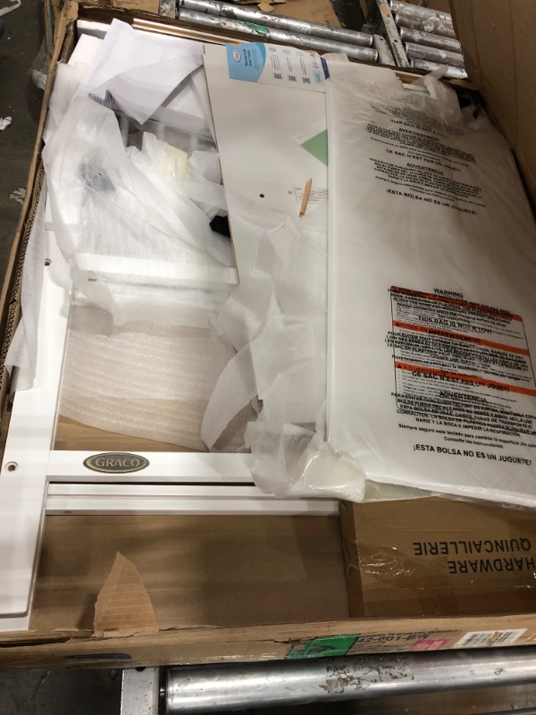 Photo 1 of * MINOR DAMAGES* Graco Olivia Changing Table with Water-Resistant Changing Pad (White) - GREENGUARD Gold Certified, Includes Bonus Water-Resistant Changing Pad with Safety Strap, 2 Open Shelves, Stylish Design