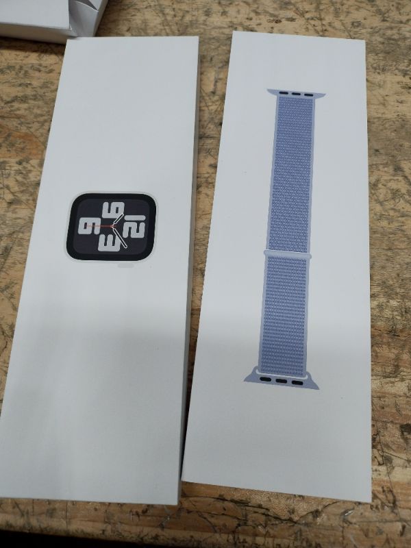 Photo 1 of Apple Watch SE (2nd Gen) [GPS + Cellular 40mm] Smartwatch with Aluminum Case with Silver Sport Loop. Fitness & Sleep Tracker, Crash Detection, Heart Rate Monitor, Retina Display, Carbon Neutral