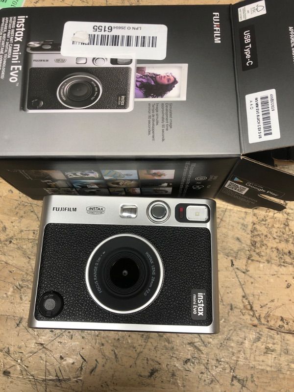 Photo 1 of Fujifilm Instax Mini EVO Instant Camera