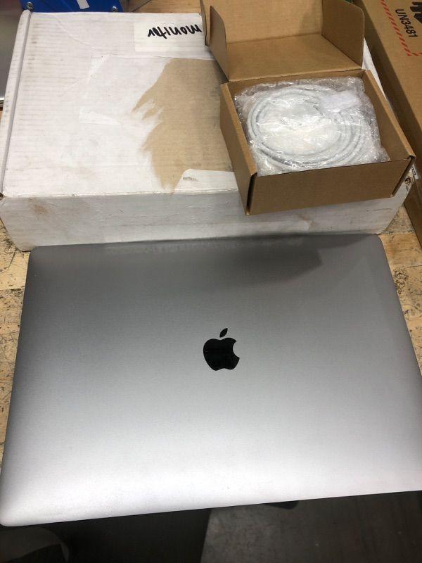 Photo 2 of ***NON REFUNDABLE, PARTS ONLY***Mid 2017 Apple MacBook Pro with 2.8GHz Intel Core i7 (15.4 inch, 16GB RAM, 256GB) Space Gray (Renewed)