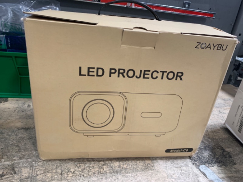 Photo 1 of ZOAYBU Upgraded Bluetooth Projector with Screen, Native 1080P Electric Focus Portable Projector for Home, Movie Projector Compatible with HDMI/USB/PC/TV Stick/Game Console/Phone, Indoor & Outdoor Use